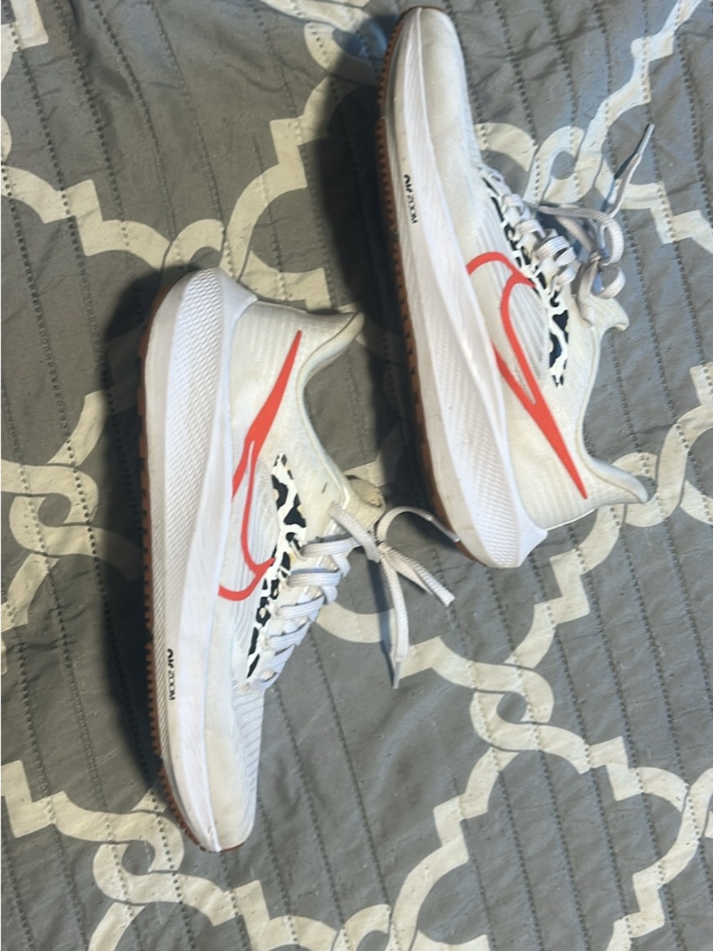 Nike Kids White Sneakers with Coral Swoosh and Black Accent